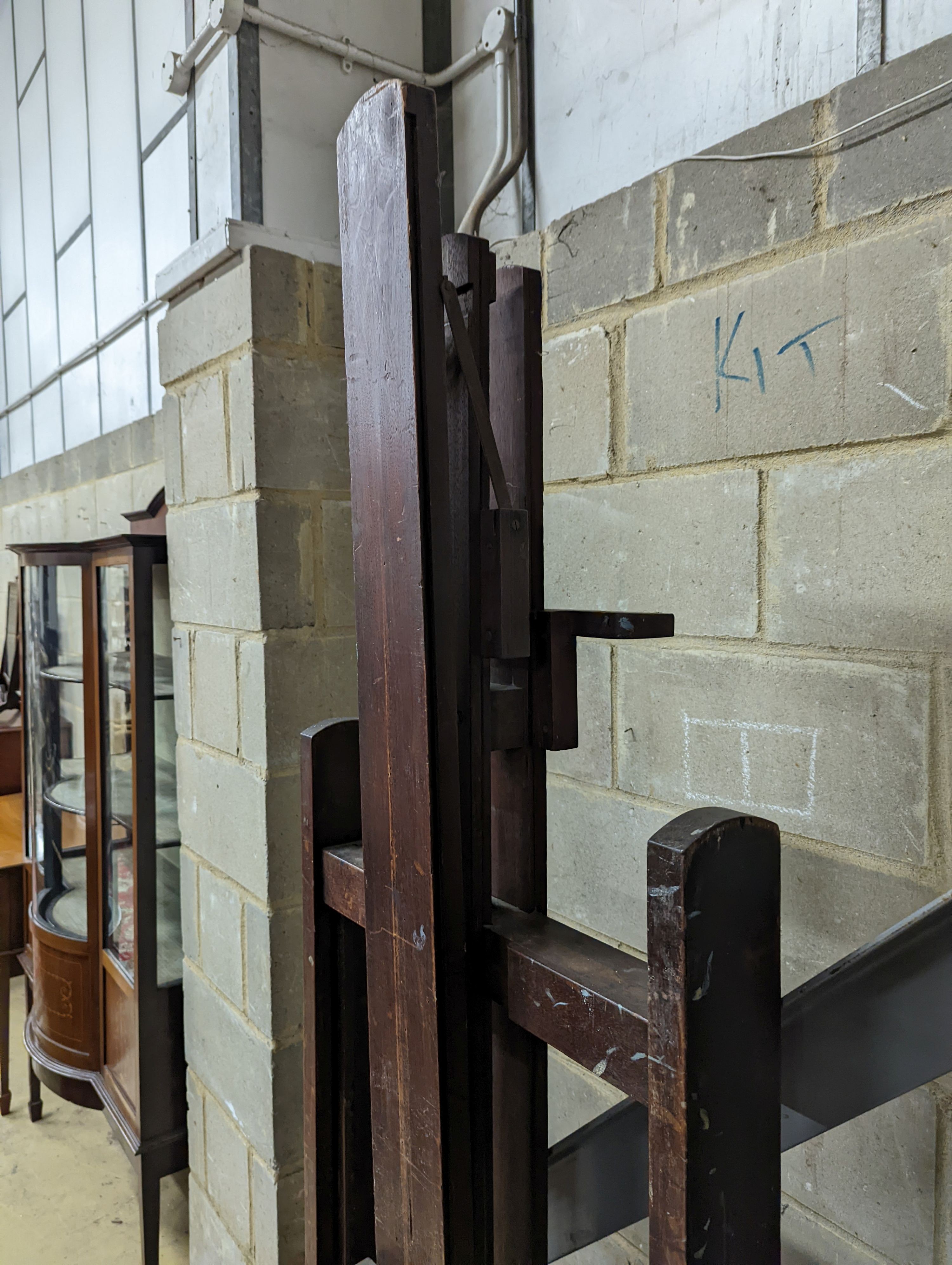 A large Newman’s of 24 Soho Square, London artists easel. Height (lowered) - 215cm, W-68cm.